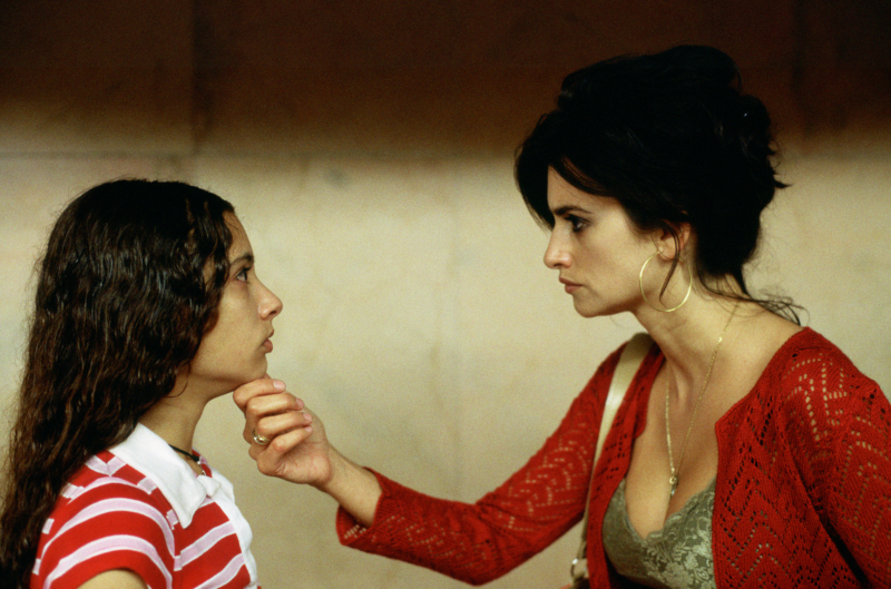 Still from VOLVER. A woman holds her daughter's chin